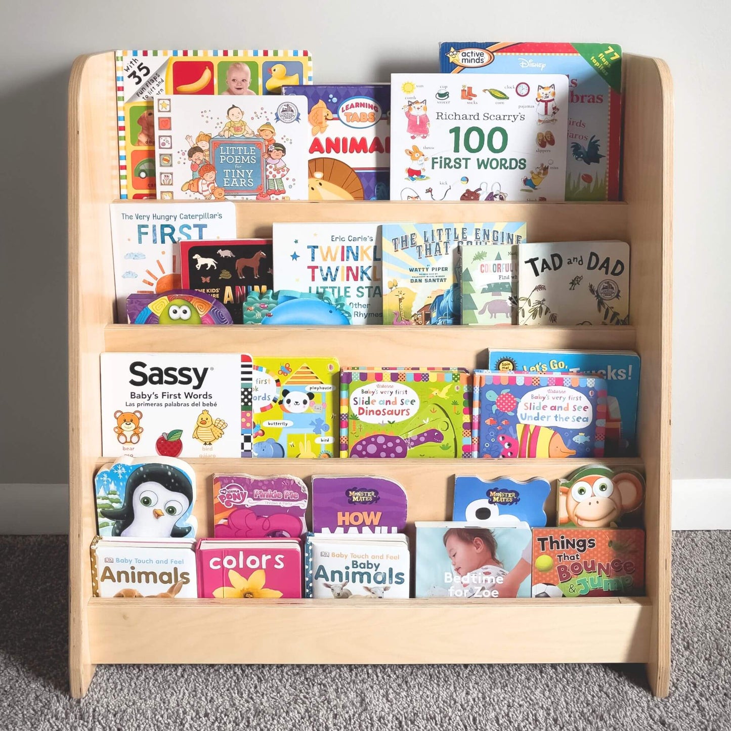 montessori bookshelf full of childrens books