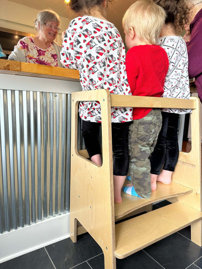 a learning tower big enough for multiple children