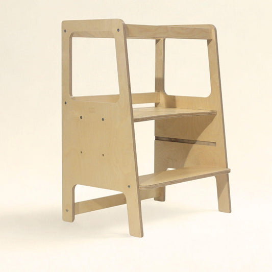 Two different sized learning towers for toddlers to help in the kitchen.  Also called toddler towers.