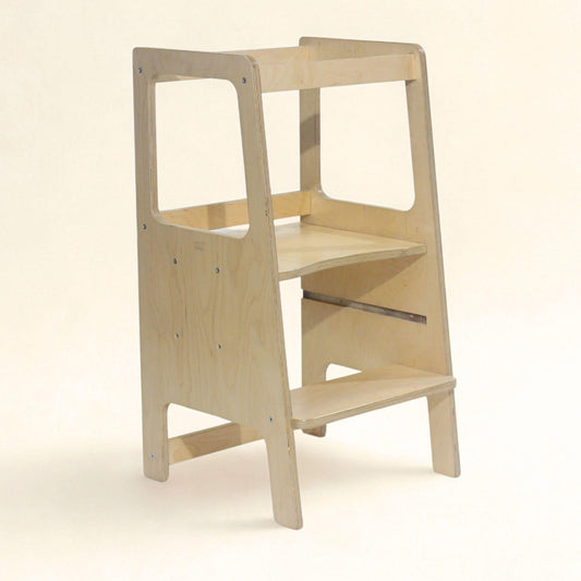 Two different sized learning towers for toddlers to help in the kitchen.  Also called toddler towers.