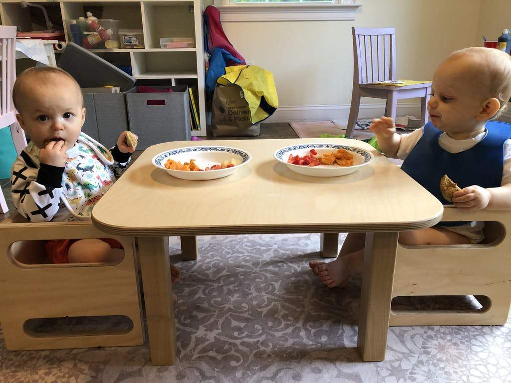 Toddler table pictured with kids table and chairs set