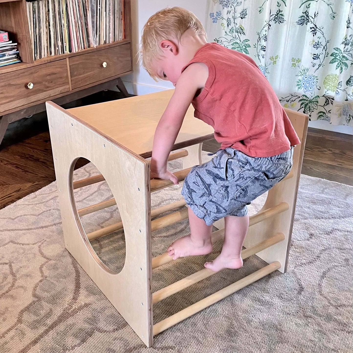 play cube with child crawling on top